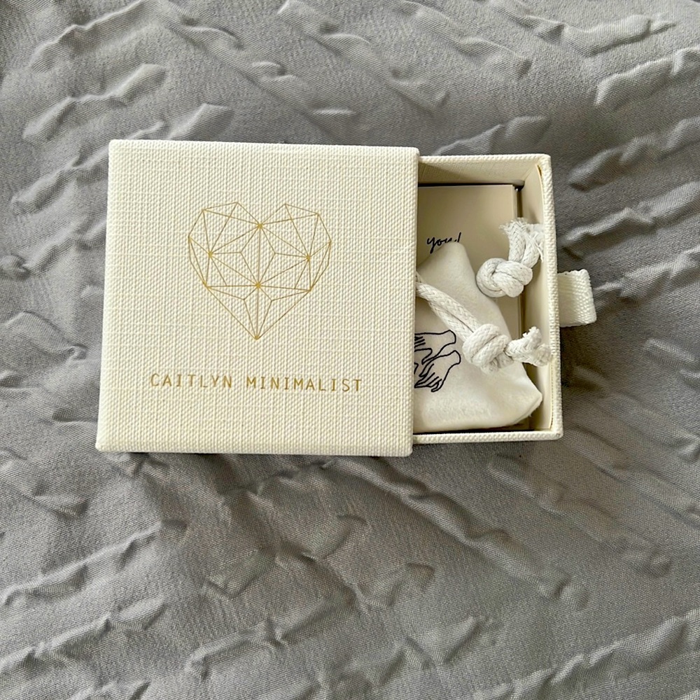 Initial “F” necklace.